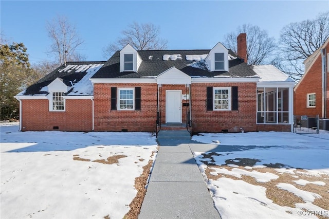 view of front of property with a sunroom