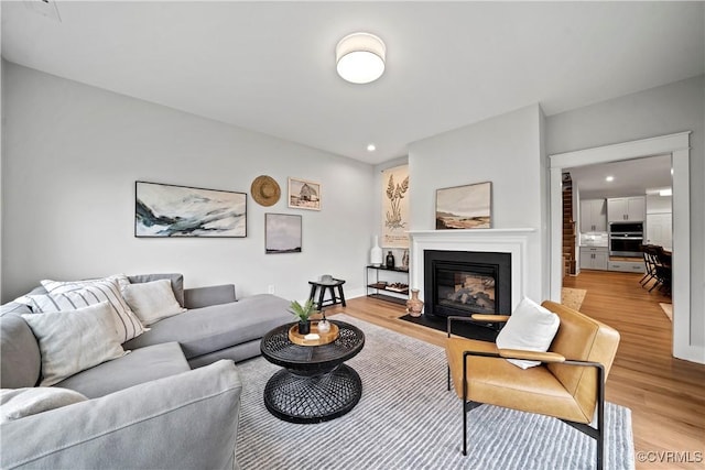 living room with light hardwood / wood-style floors