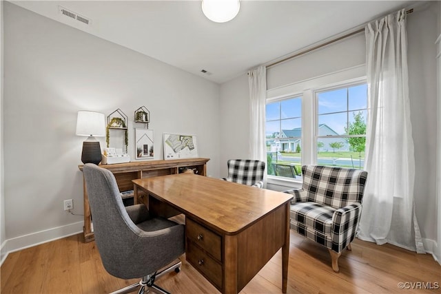 office space featuring light wood-type flooring