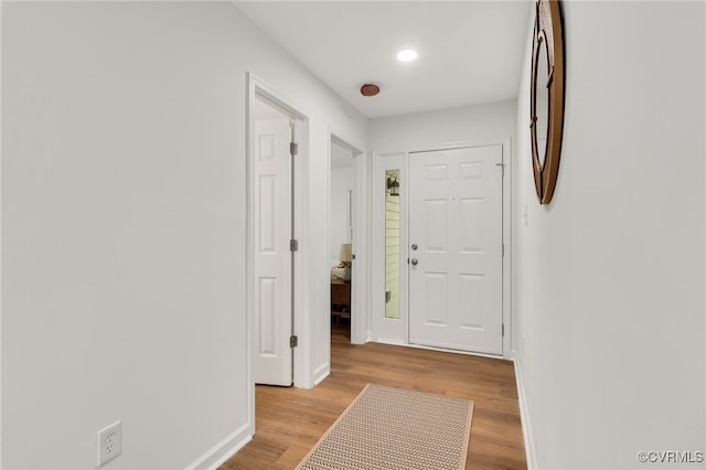 corridor featuring light hardwood / wood-style flooring