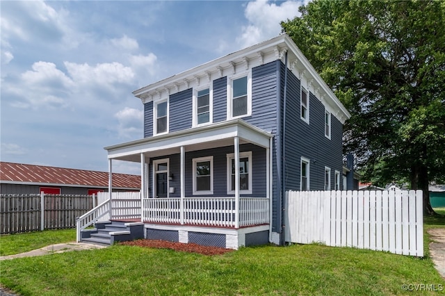 207 E Virginia Ave, Crewe, VA 23930 - italianate-style house featuring covered porch