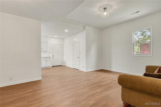 207 E Virginia Ave, Crewe, VA 23930 - sitting room with light wood-style flooring and recessed lighting