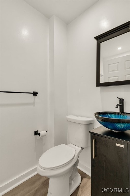 207 E Virginia Ave, Crewe, VA 23930 - half bath with wood finished floors and vanity