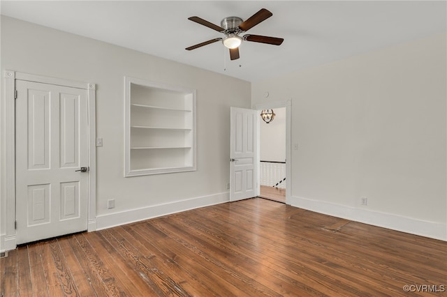 207 E Virginia Ave, Crewe, VA 23930 - unfurnished bedroom with wood finished floors and a ceiling fan