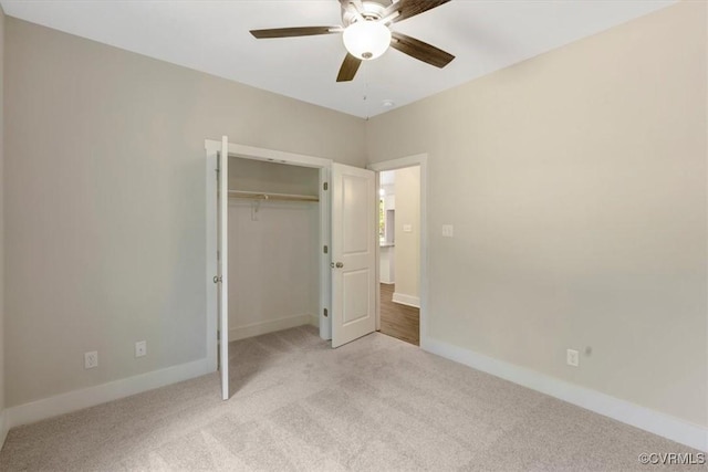 548 Anchor Dr, Bracey, VA 23919 - unfurnished bedroom with light colored carpet, a closet, and a ceiling fan
