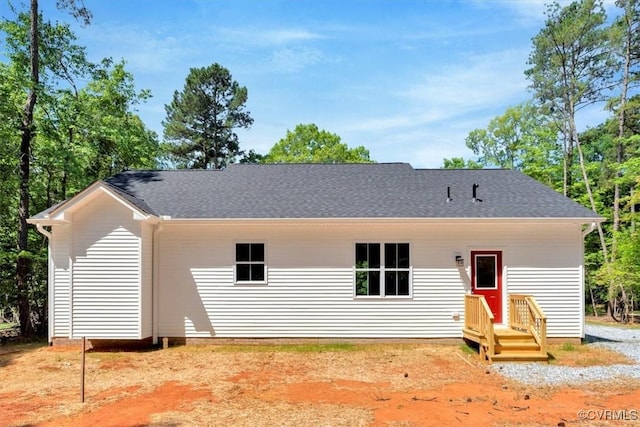 548 Anchor Dr, Bracey, VA 23919 - back of house with roof with shingles