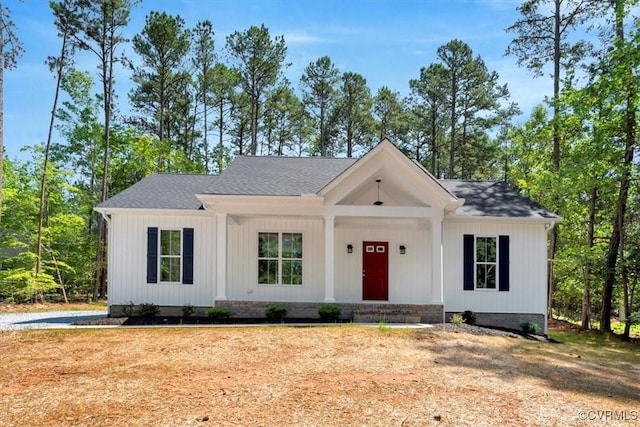 548 Anchor Dr, Bracey, VA 23919 - modern farmhouse with covered porch and roof with shingles