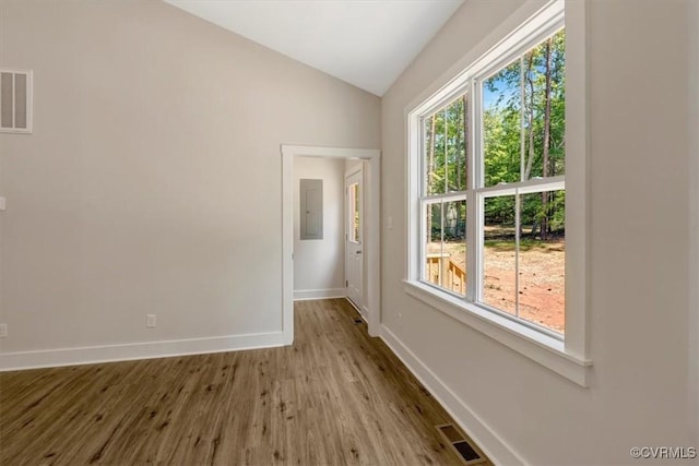 548 Anchor Dr, Bracey, VA 23919 - empty room featuring vaulted ceiling and wood finished floors