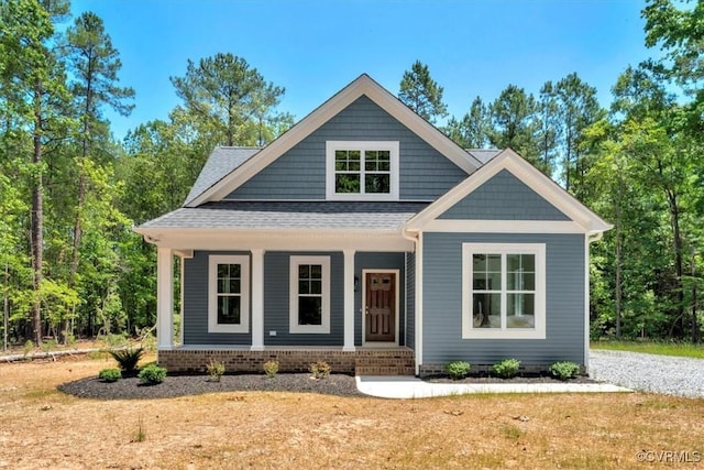 73 Jamestown Ln, Bracey, VA 23919 - craftsman inspired home featuring covered porch and a shingled roof