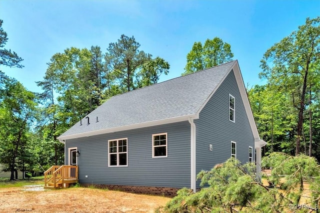 73 Jamestown Ln, Bracey, VA 23919 - view of side of home with a shingled roof