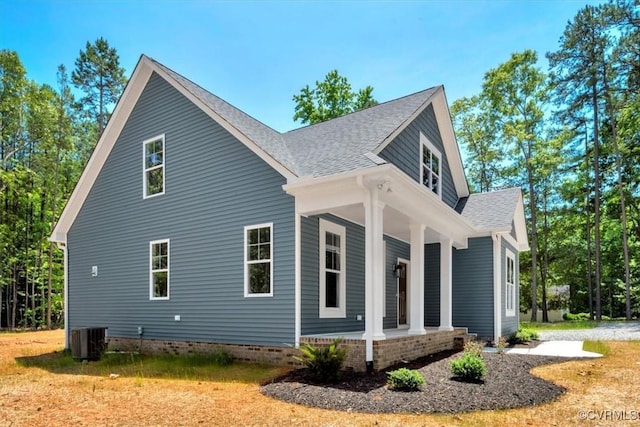 73 Jamestown Ln, Bracey, VA 23919 - view of home's exterior featuring a porch and roof with shingles