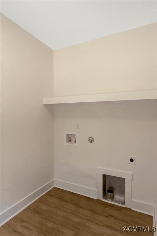 73 Jamestown Ln, Bracey, VA 23919 - laundry area with hookup for a washing machine, hookup for an electric dryer, gas dryer hookup, and wood finished floors