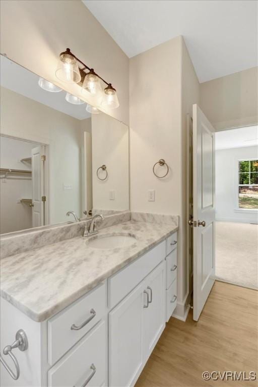 73 Jamestown Ln, Bracey, VA 23919 - bathroom with wood finished floors and vanity