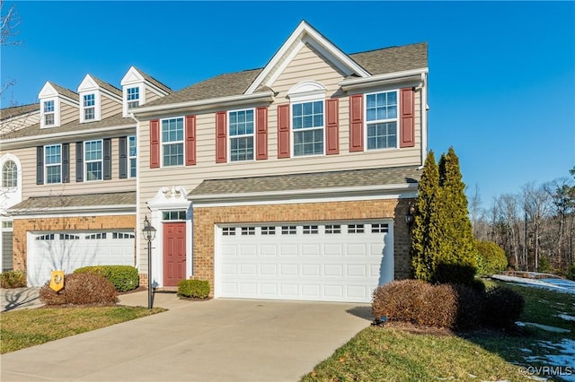 view of front of property with a garage