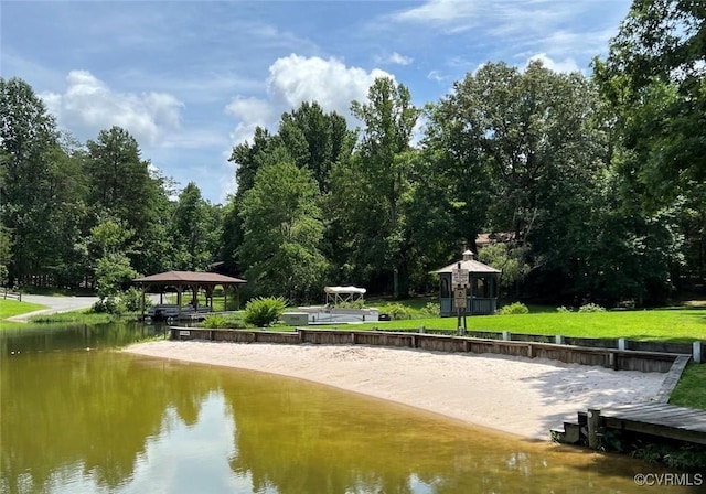 view of home's community featuring a gazebo and a water view