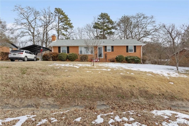 single story home featuring a carport