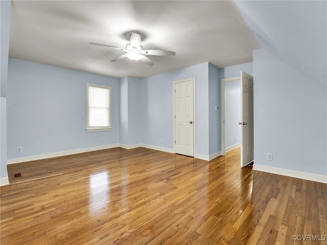 interior space with ceiling fan and light hardwood / wood-style flooring