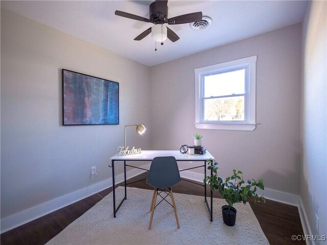 office with ceiling fan and dark hardwood / wood-style floors