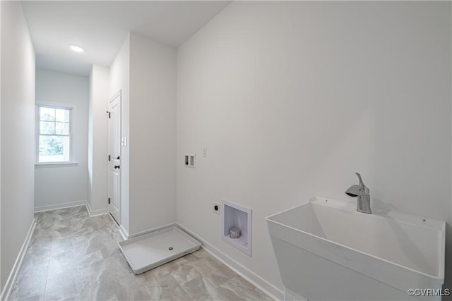 laundry room featuring electric dryer hookup, sink, and hookup for a washing machine