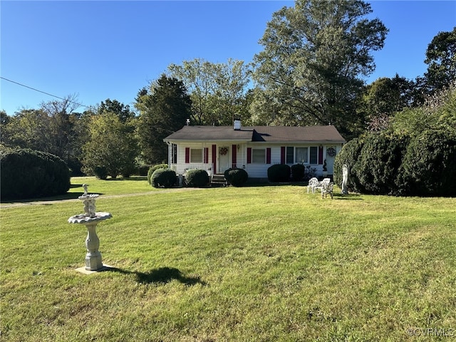 ranch-style home featuring a porch and a front yard