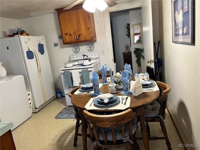 dining space featuring ceiling fan