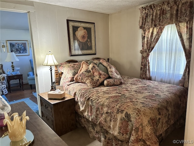 bedroom featuring a textured ceiling