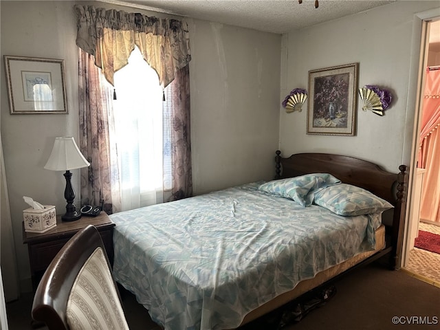 bedroom with a textured ceiling