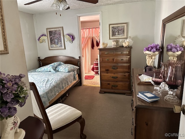 carpeted bedroom with a textured ceiling, a closet, a spacious closet, and ceiling fan