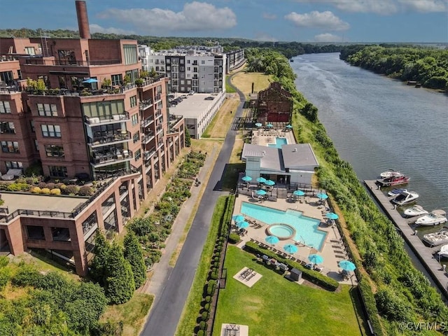 birds eye view of property featuring a water view