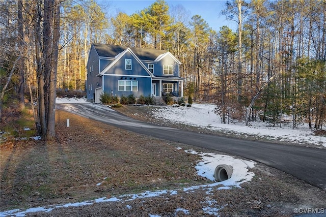 front of property with a garage