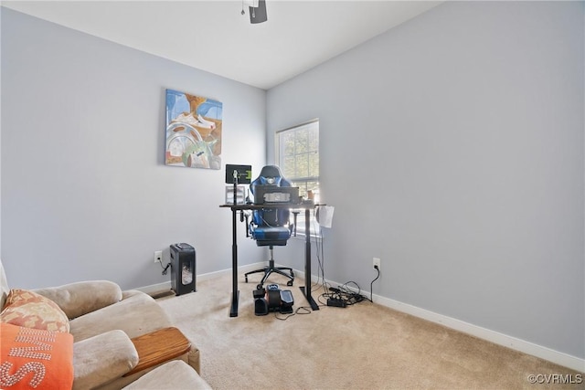 workout room with carpet floors and baseboards