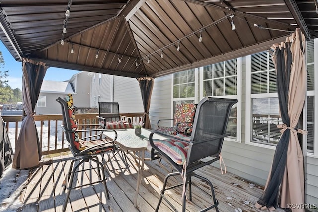 wooden terrace with a gazebo