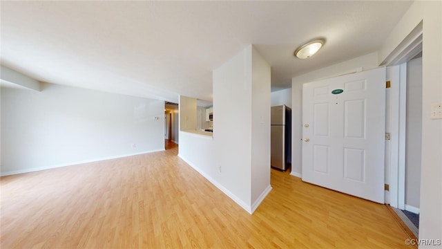 foyer with light hardwood / wood-style flooring