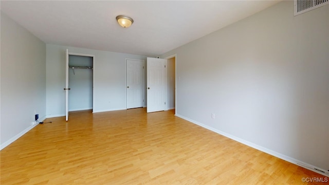 unfurnished bedroom with light hardwood / wood-style flooring