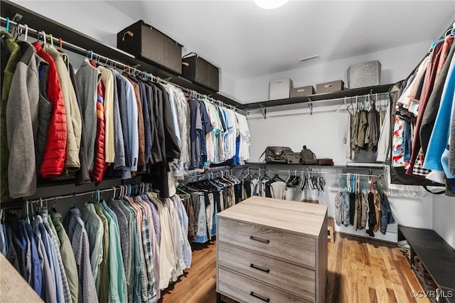 walk in closet featuring light wood-type flooring