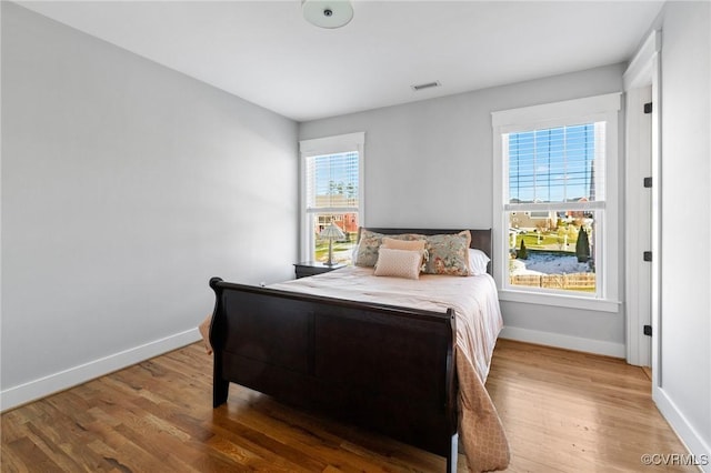 bedroom featuring wood-type flooring