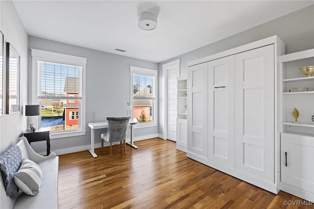 sitting room featuring hardwood / wood-style flooring