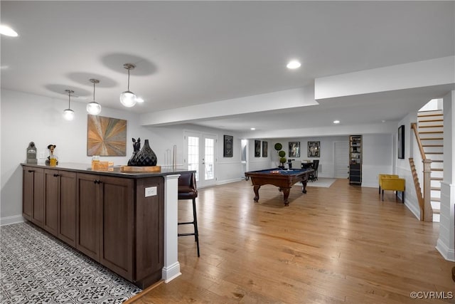 11163 Independence Rd, Ashland, VA 23005 - interior space with dark brown cabinetry, french doors, light hardwood / wood-style flooring, billiards, and decorative light fixtures