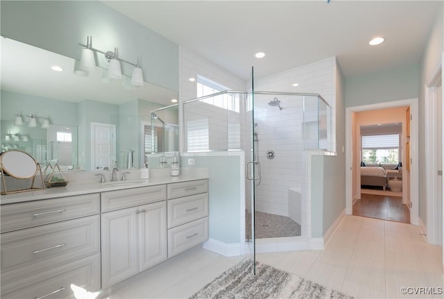 11163 Independence Rd, Ashland, VA 23005 - bathroom featuring tile patterned flooring, vanity, and a shower with shower door