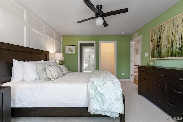 11163 Independence Rd, Ashland, VA 23005 - bedroom with a spacious closet, a closet, ceiling fan, and light carpet