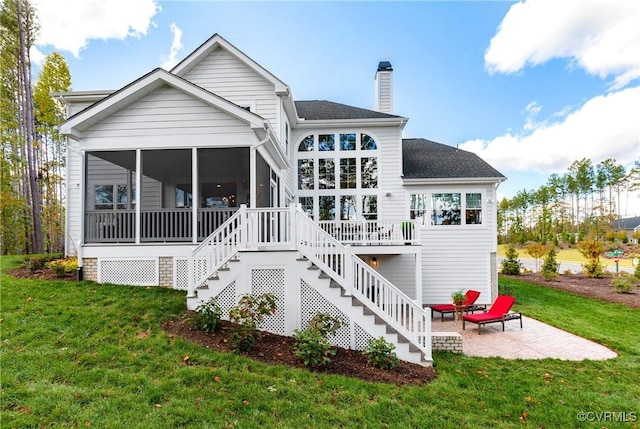 11163 Independence Rd, Ashland, VA 23005 - back of house featuring a patio, a lawn, and a sunroom