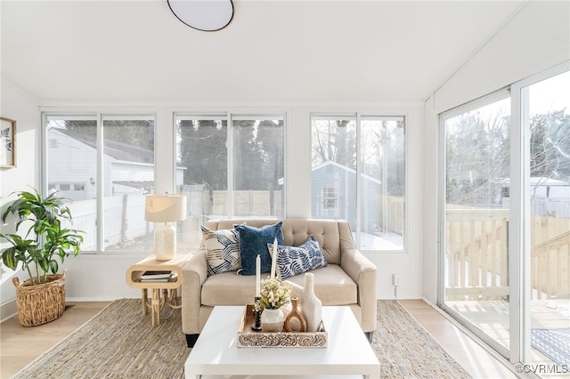 sunroom with vaulted ceiling