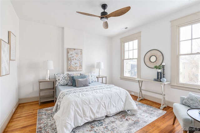 bedroom featuring wood-type flooring and ceiling fan