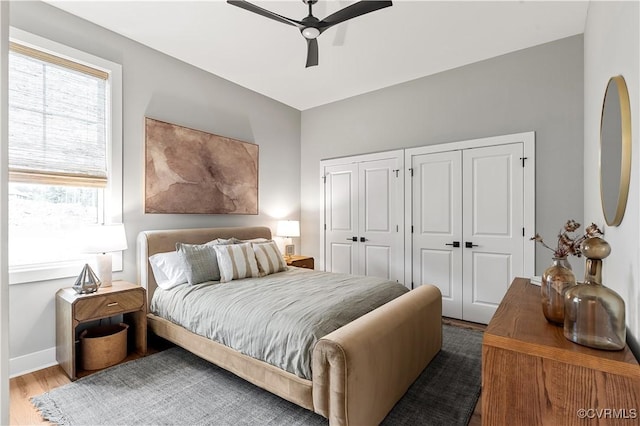 bedroom featuring ceiling fan and wood-type flooring