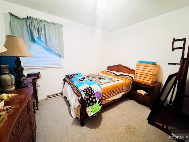 bedroom featuring light carpet and ceiling fan