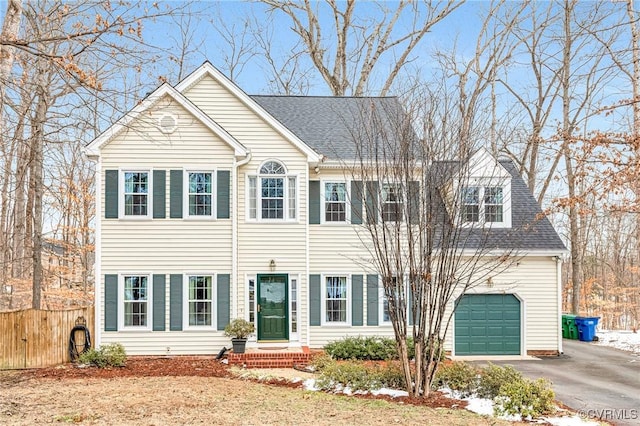 view of front of property with a garage