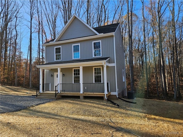 view of property featuring covered porch