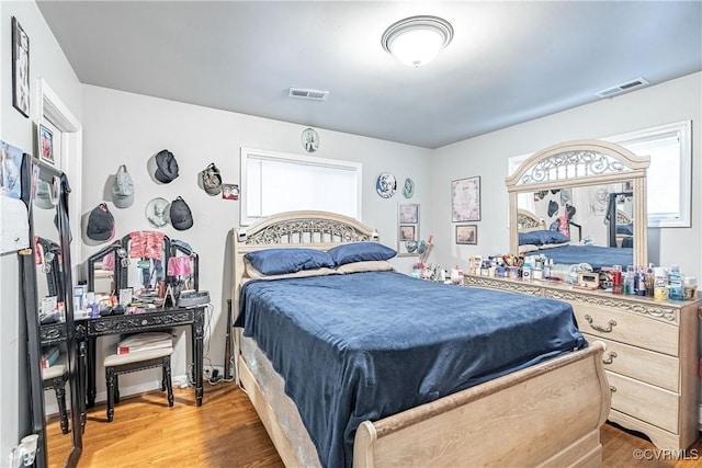 bedroom featuring hardwood / wood-style flooring