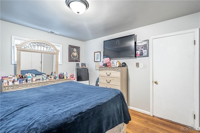 bedroom featuring hardwood / wood-style floors