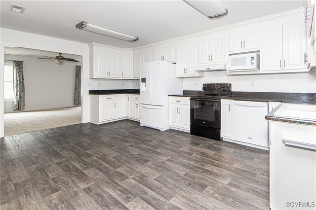 kitchen with sink, white cabinetry, ceiling fan, dark hardwood / wood-style floors, and white appliances